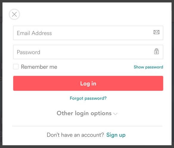 Hide social auth options in a dropdown, show the full email login form.