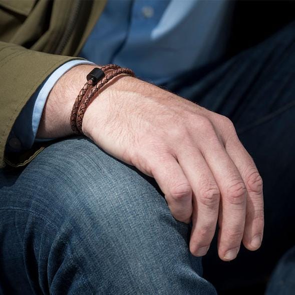 Man wearing the Braided leather ashes bracelet