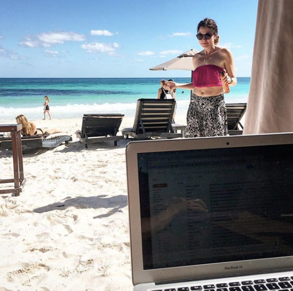 laptop set up on a beach