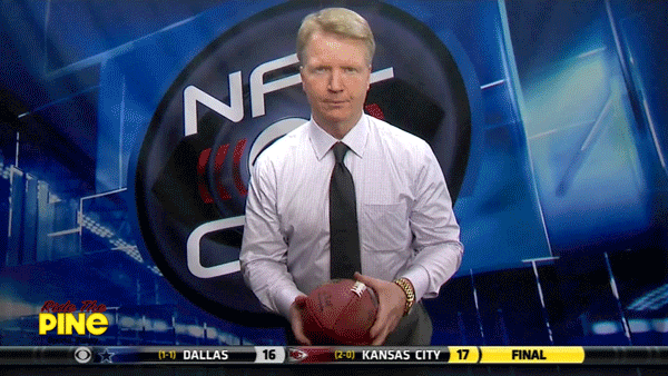 Phil Simms Demonstrates Football holding