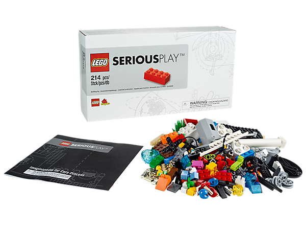 The Lego Serious Play Starter Kit box, instructions and lego pieces in a pile