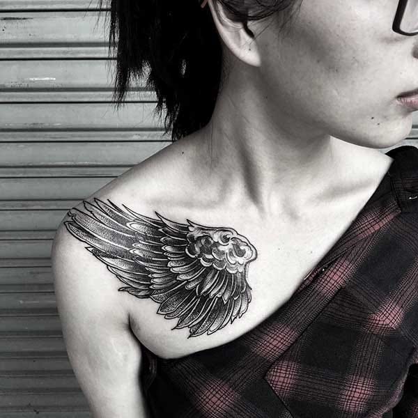 collarbone wing tattoo