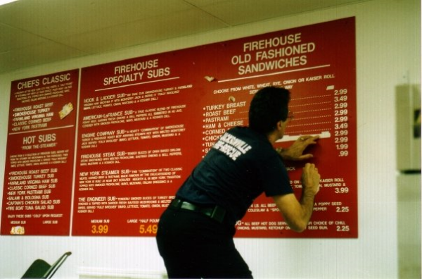 Captain Rob placing letters on the original menu board — Jacksonville, Fla. (1994)