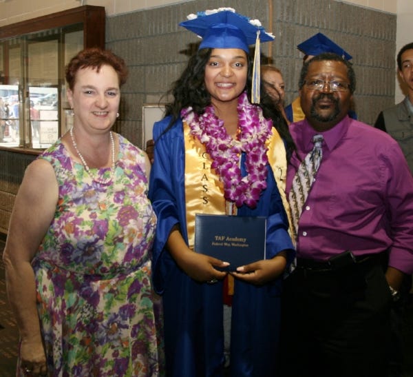 Sanders with his daughter, Rose, and wife, Donna, on the teen's graduation day.