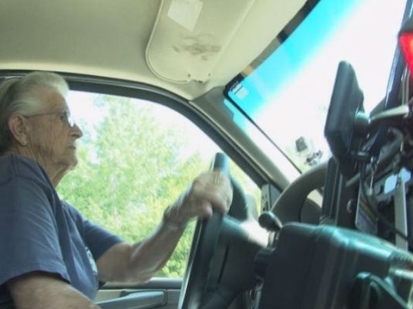 Edna Mitchell at the wheel of her ambulance. PHOTO CREDIT: WCSH