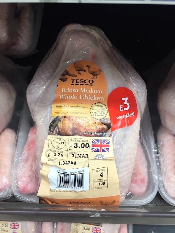 The supermarket Tesco selling a whole fresh chicken for £3.00