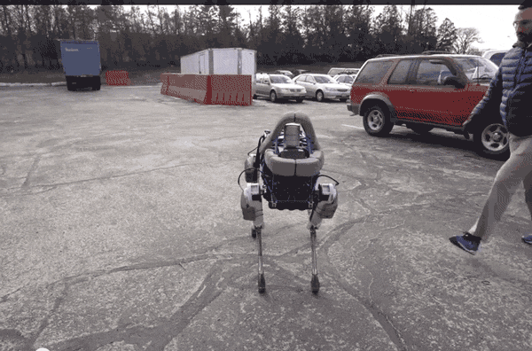 DARPA robot gets kicked, stays upright.