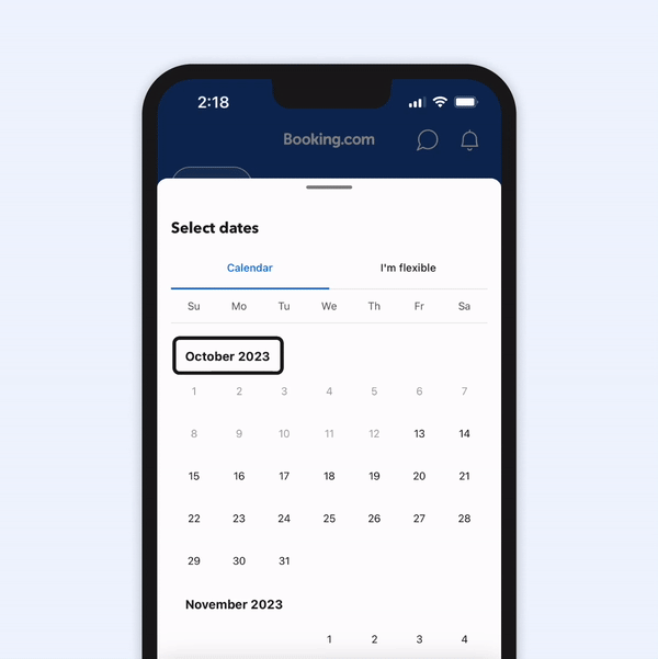 A GIF of the Booking.com app calendar. The focus box jumps from October 2023 to November 2023, showing the updated month-to-month navigation. Then the focus moves to select 2nd to 4th November for travel dates.