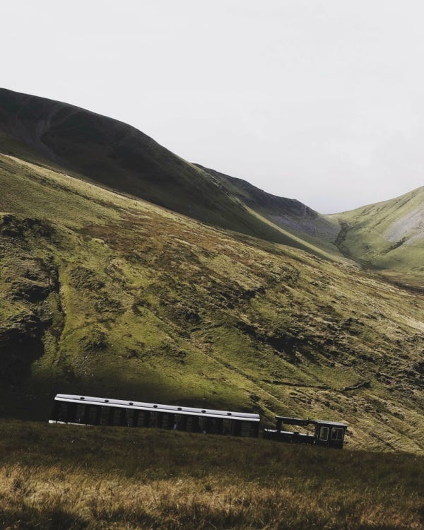 A train going up the Snowdon mountain railway out of Llanberis