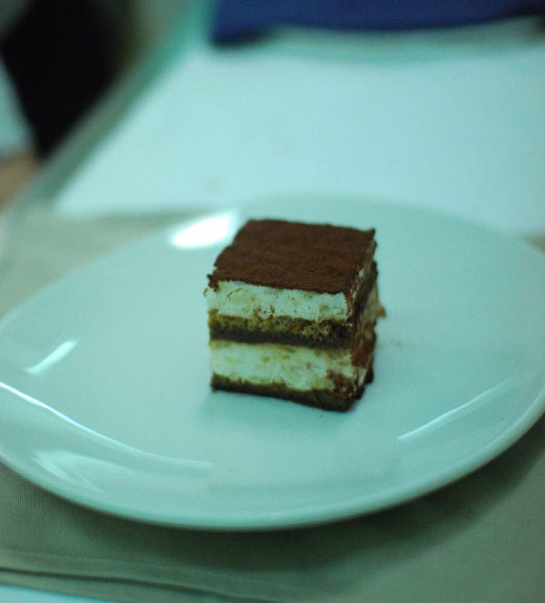 Layers of coffee-soaked sponge fingers topped with cream of rice and mascarpone cheese