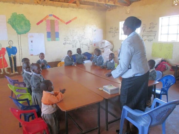 Colorful walls and bright-eyed learners.