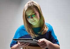 Blue-Light-Person-Reading-Tablet