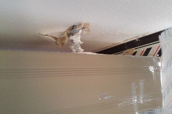 screw in type plasterboard fixing pulling out of a ceiling