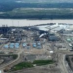 Suncor’s Millenium heavy upgrader plant across Athabasca River from old reclaimed tailings pond