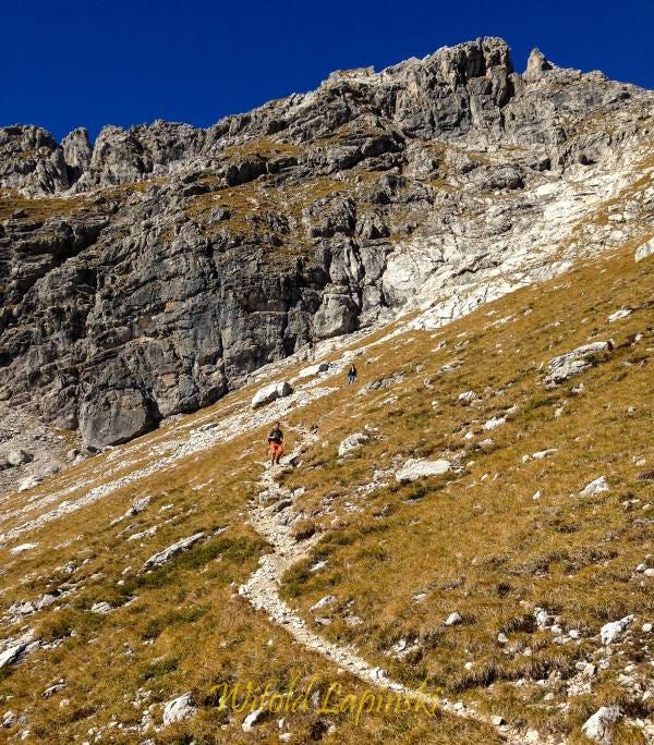 Two men are hiking in the Alps of southern Germany.