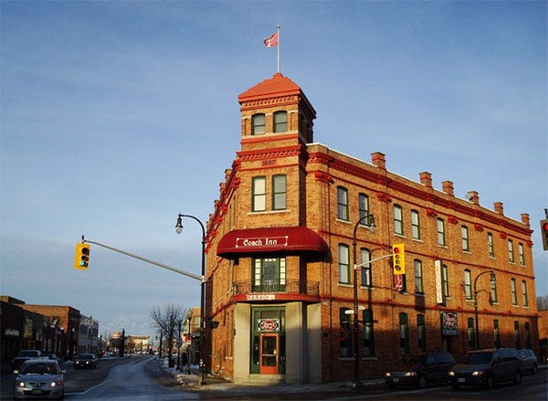 Red brick building known as the Crown Inn in Owen Sound