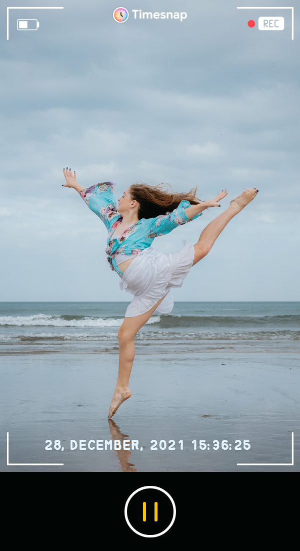 A girl showing her flexibility with a dance move on beach