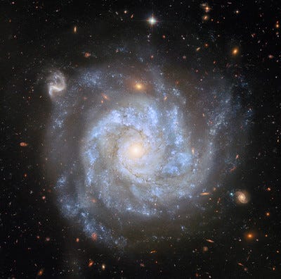 Was the Universe Born Spinning- A New Theory Emerges