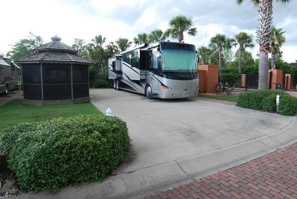 A luxury RV parked at a top RV Resort in Gulf Shores, AL