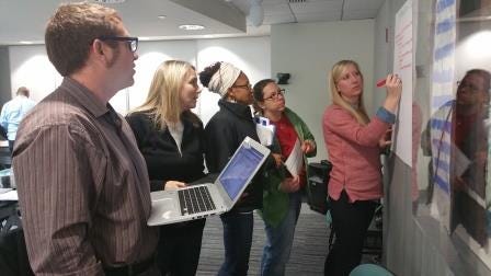 Georgia Everett and fellow NGSS cadre members collaborate to analyze science lessons using the EQuIP Rubric for Science Lessons and Units.