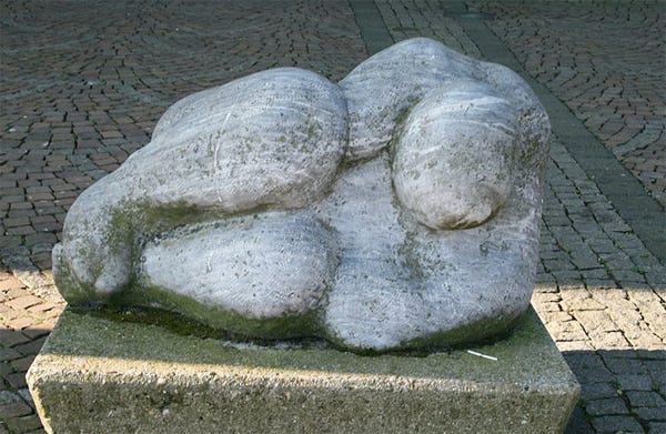 “File:Sculpture Woman Alkmaar.jpg” by Familieman is licensed under CC BY-SA 3.0