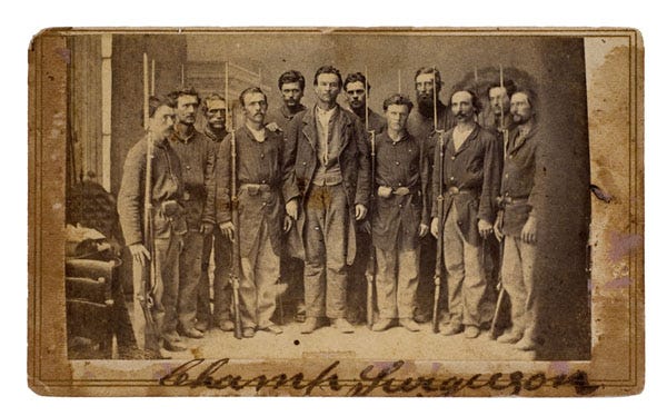 An image of Champ Ferguson and his men. Champ is 6th from left.