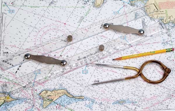 Nautical chart with navigation instruments
