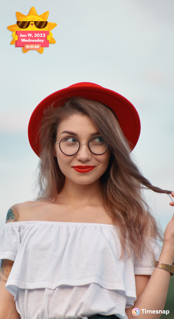 A girl giving pose with red hat