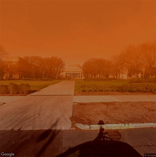 AI generated MIT dome overlaid with orange haze from fires