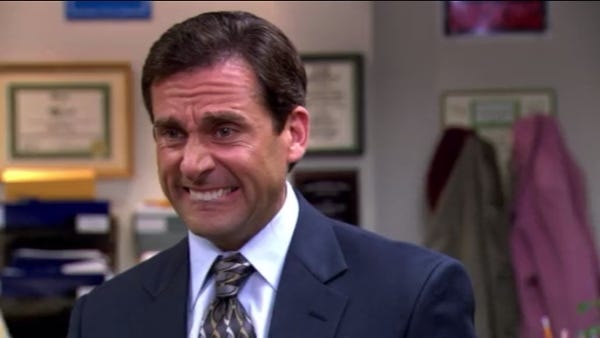 The Office’s Michael Scott’s fake smile