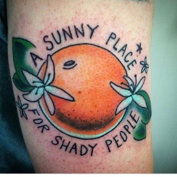 Peach and Script Tattoos