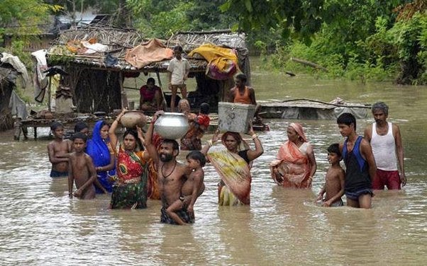 Some people of Bihar are migrating to the another place carrying their household goods as their house in completely destroyed by the floods in the Koshi river.