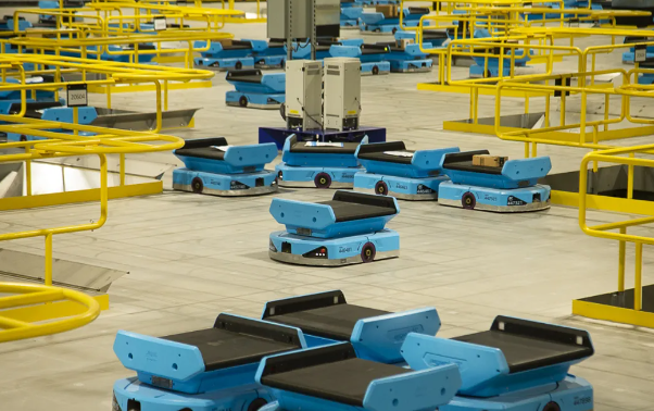 Some Amazon mobile robots in a typical distribution center
