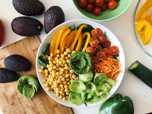 Buddha bowl of chickpeas,  vegetables and avocado