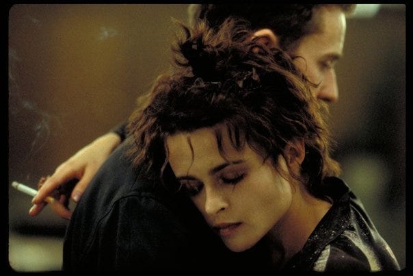 Edward Norton and Helena Bonham-Carter hugging it out in the moment that really begins the story