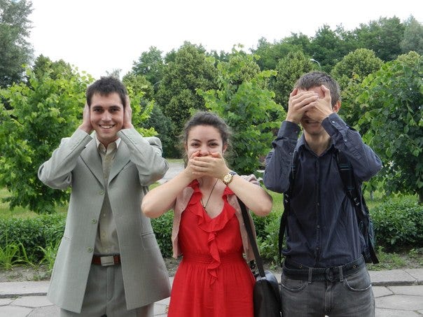 Sasha and two of her best friends impersonating ‘the three wise monkeys’ after graduating in Kyiv, as the graduation gave them full freedom to do what they want