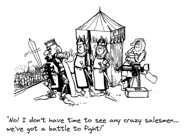 The picture shows the king with a sword standing in front of the tent with his guards. An army is visible in the background, preparing to attack. The army is armed with swords and spears. Next to the king stands a man with a machine gun. The king waves him off and says: “No! I don’t have time to see any crazy salesmen… we’ve got a battle to fight!”