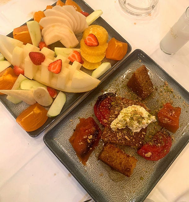 Mixed fruit plate and dessert served at Raki Balik restaurant