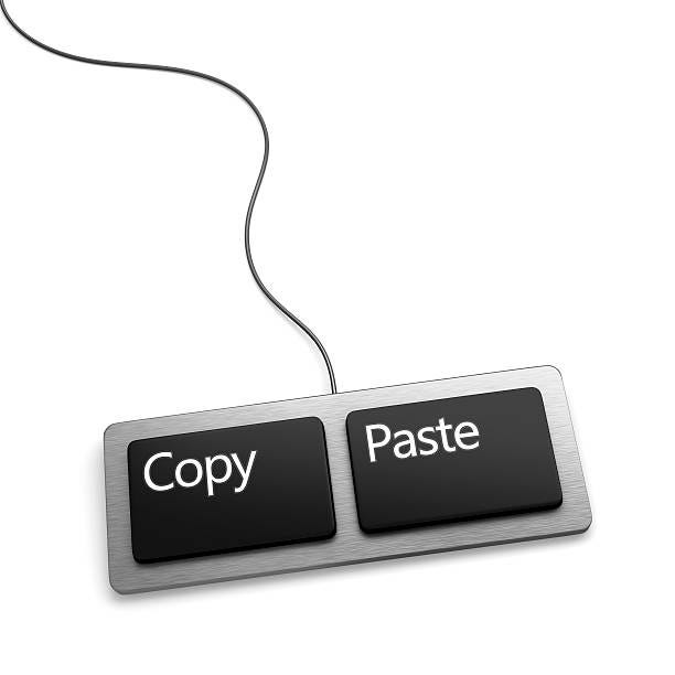 Keys from a keyboard showing “copy” and “paste” side by side, depicting what happens during generic applications.