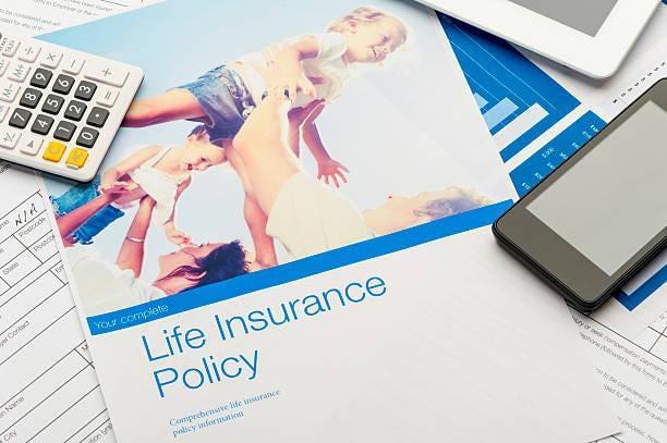 Life insurance policy book on a table