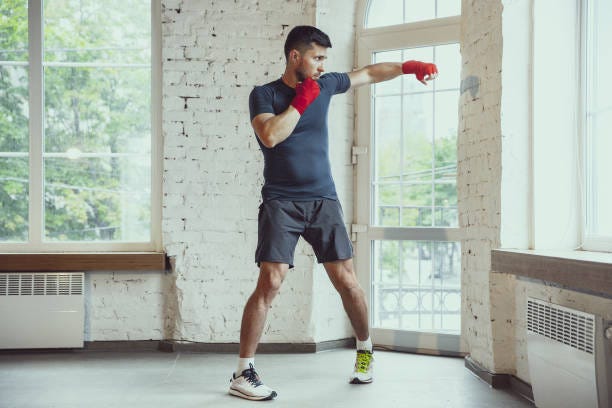 It is very possible to learn basic boxing skills on your own, but quicker advancement requires a trainer.