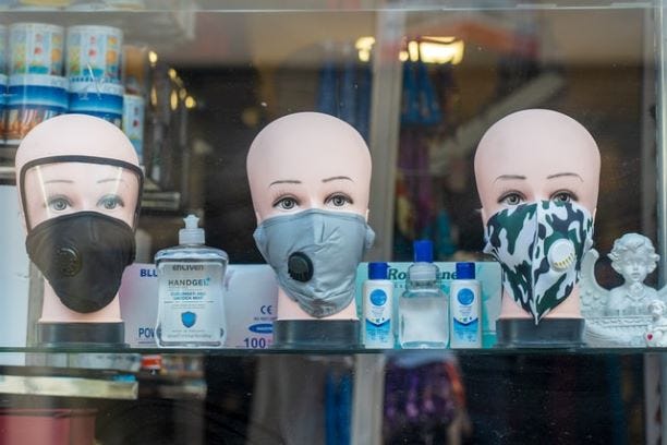 Storefront of masks and hand sanitizer