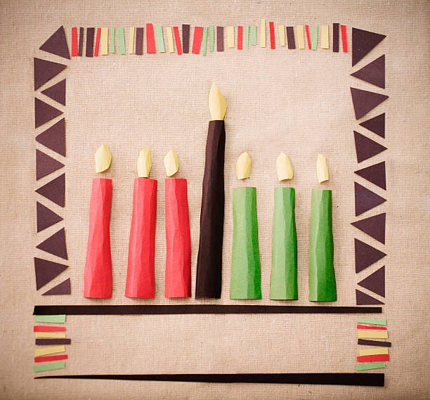 Kwanzaa candles. The black candle symbolizes the people, the three red candles are for the struggle and the three green candles represent the Earth.