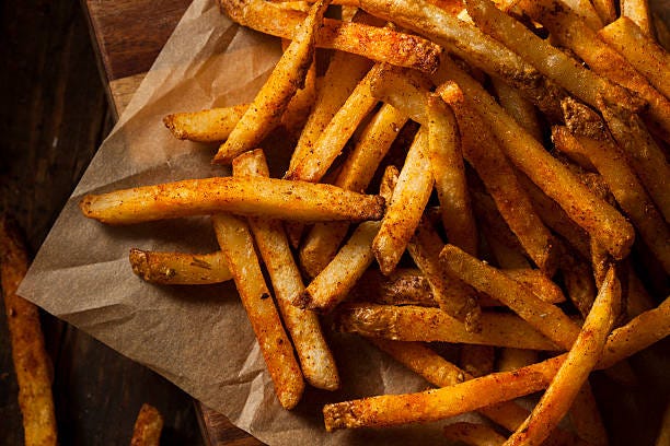 hot french fries with color golden