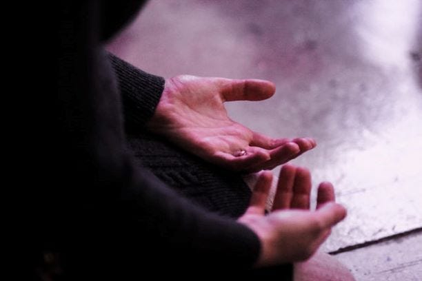 Hands open — a married woman in seated meditation