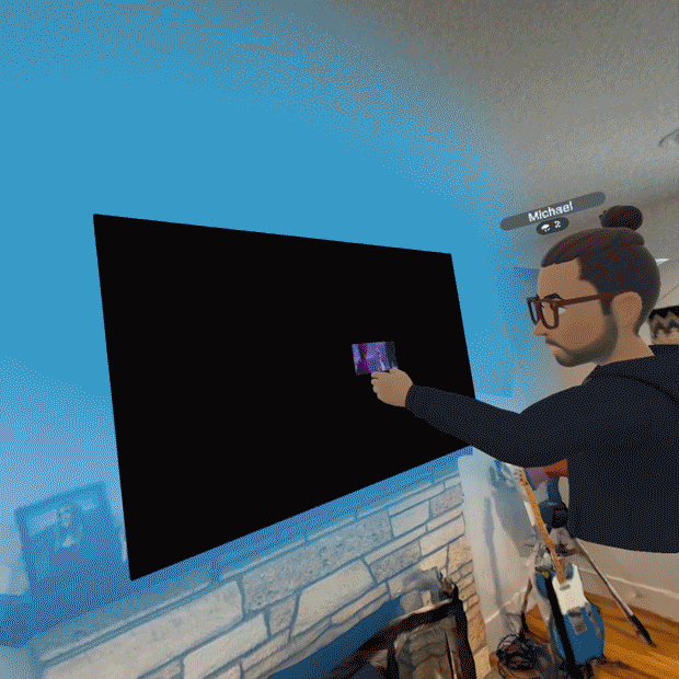 A man’s avatar crafting a Frozen media experience for a living roon in VR.