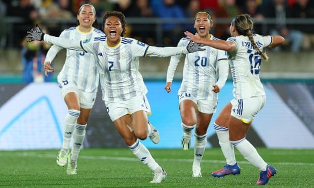 photo of Philippines players celebrating scoring a goal