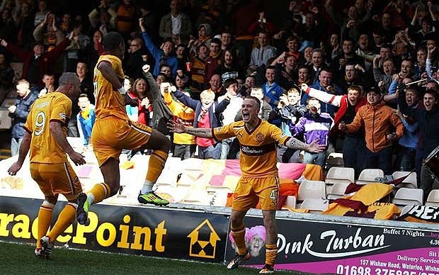 Nicky Law celebrating in front of the Motherwell fans