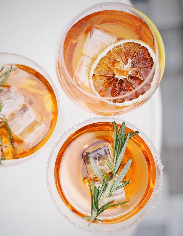 stylish orange cocktails in glasses