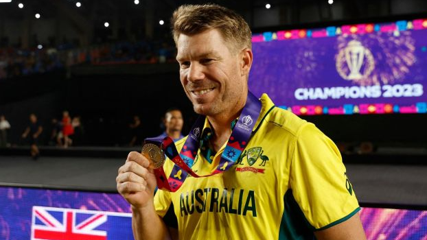 Australia’s David Warner celebrates with his medal after winning the ICC Cricket World Cup.